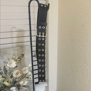 Brandy Melville Black Belt with Silver Buckle and Eyelets. One size.